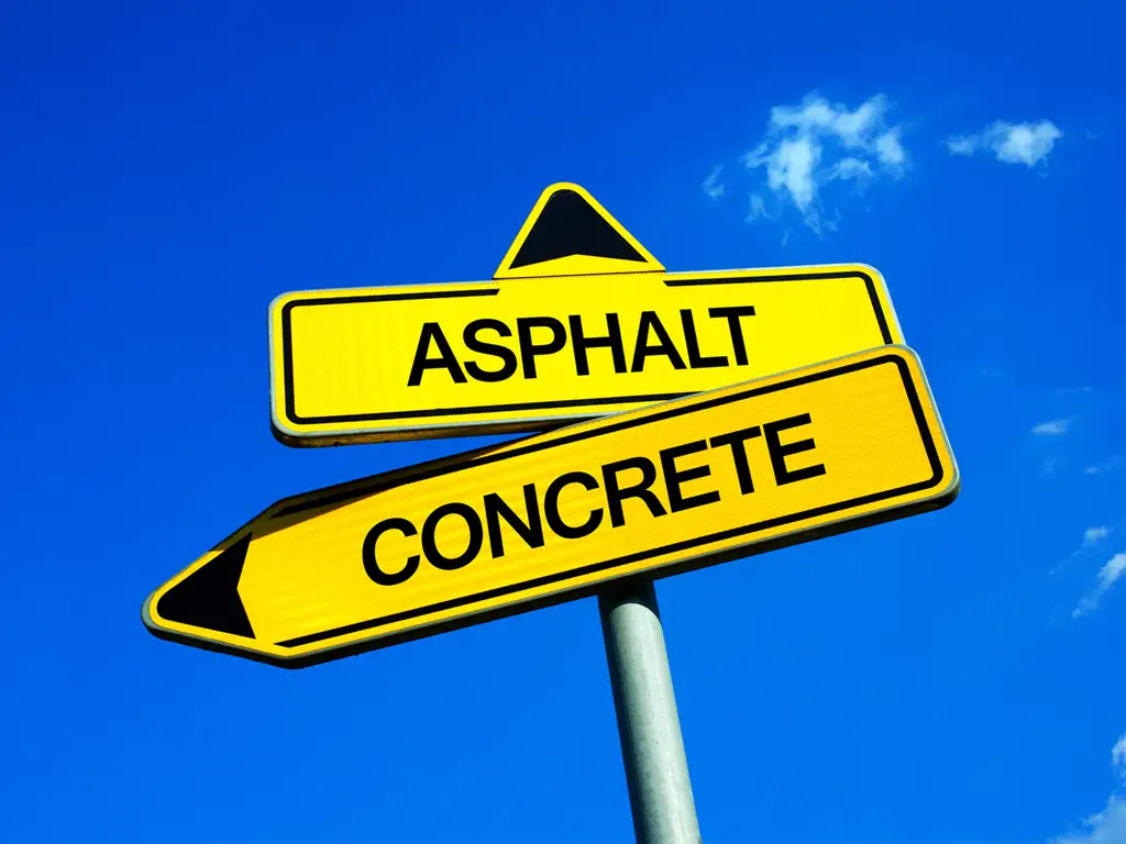 Asphalt and concrete signage to indicate that Asphalt Direct Paving offers both.